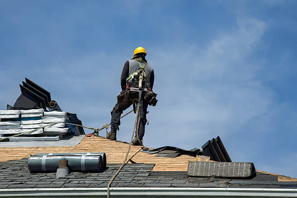 Professional Roof Replacement technician working in East Springfield, OH
